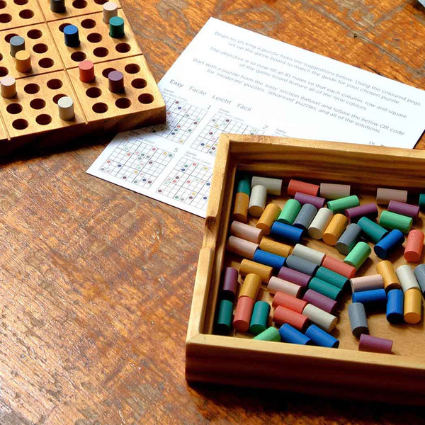 A colour sudoku on a wooden table top