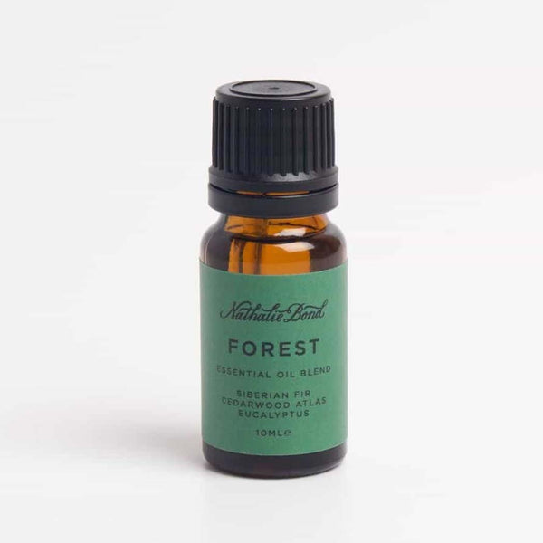 Forest essential oil on a white background