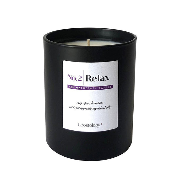 A black scented candle gift on a white background