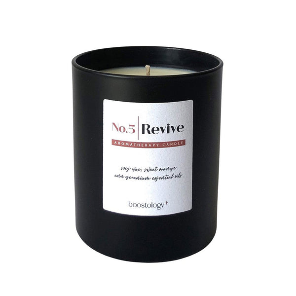 A revive scented candle gift on a white background