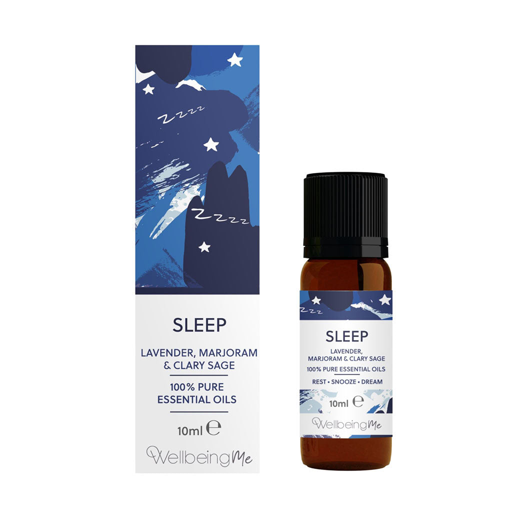 An amber essential oil bottle with a blue sleep label