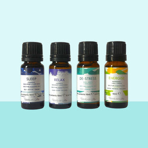 Four essential oil bottles with the words sleep, relax, de-stress and energise