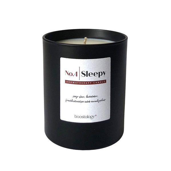 A black scented candle gift on a white background