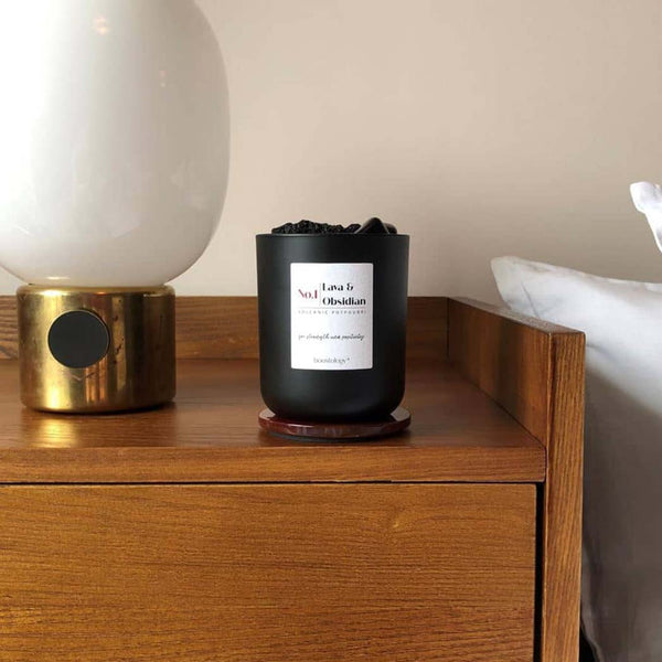 The essential oil diffuser on a bedside table